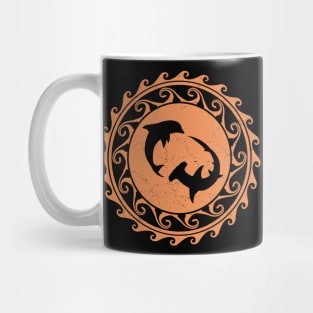 Hammerhead shark and dolphin on polynesian sun Mug